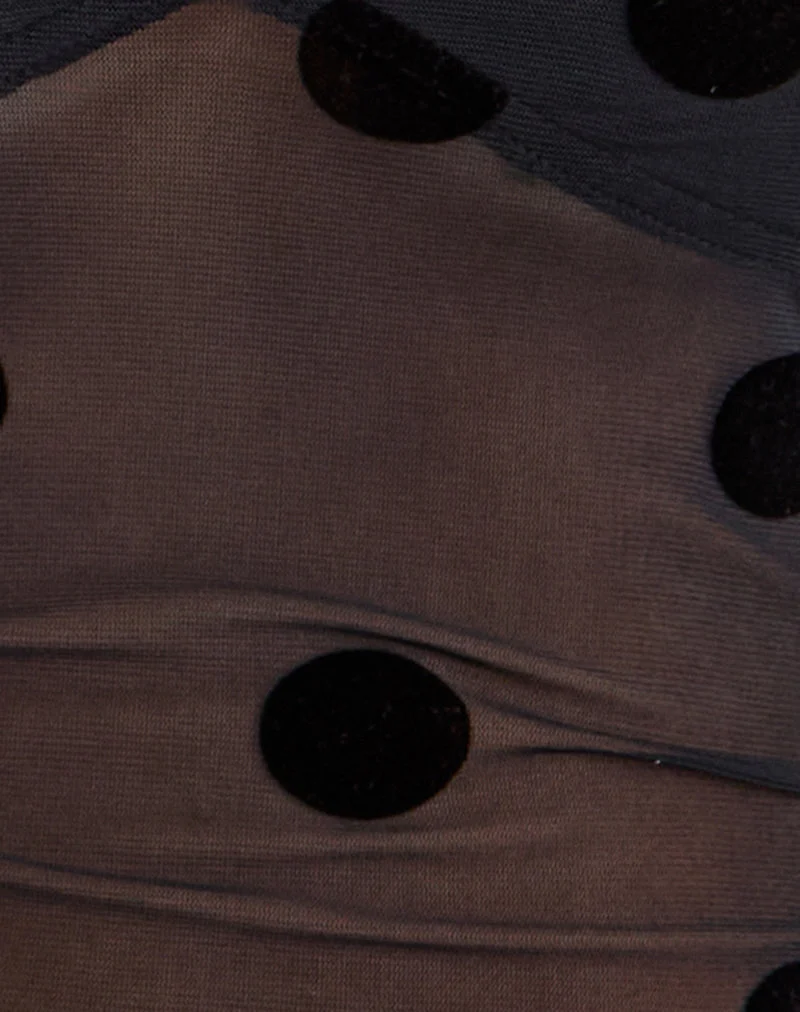 Lihat Top en noir à gros pois