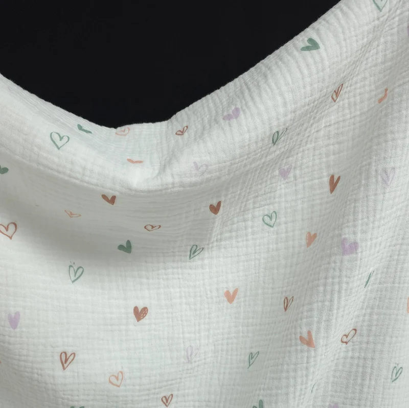 Tissu Double Gaze XNUMX% Coton | Cœurs Pastel sur Fond Blanc