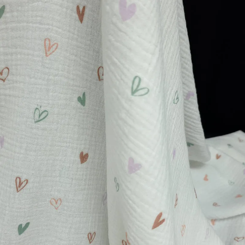 Tissu Double Gaze XNUMX% Coton | Cœurs Pastel sur Fond Blanc
