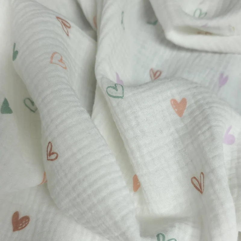 Tissu Double Gaze XNUMX% Coton | Cœurs Pastel sur Fond Blanc